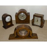 Three mantle clocks and a clock case