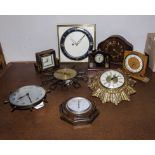 A number of retro mantle and wall clocks