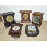 Three mantle clocks and two wall clocks