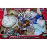 A box containing assorted pottery items