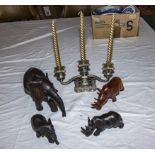 A 3 branch candelabra and four wooden animals