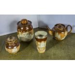 Doulton stoneware biscuit jar, teapot, silver rimmed beaker and a lidded jar