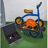 A child's bike, skateboard, golf putter and other items