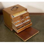 A 1920's mah jong set in a wooden case