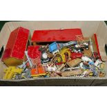 A box containing farmyard buildings and animals