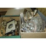 Two boxes containing silver plate and brass