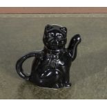 A Jackfield style pottery cat