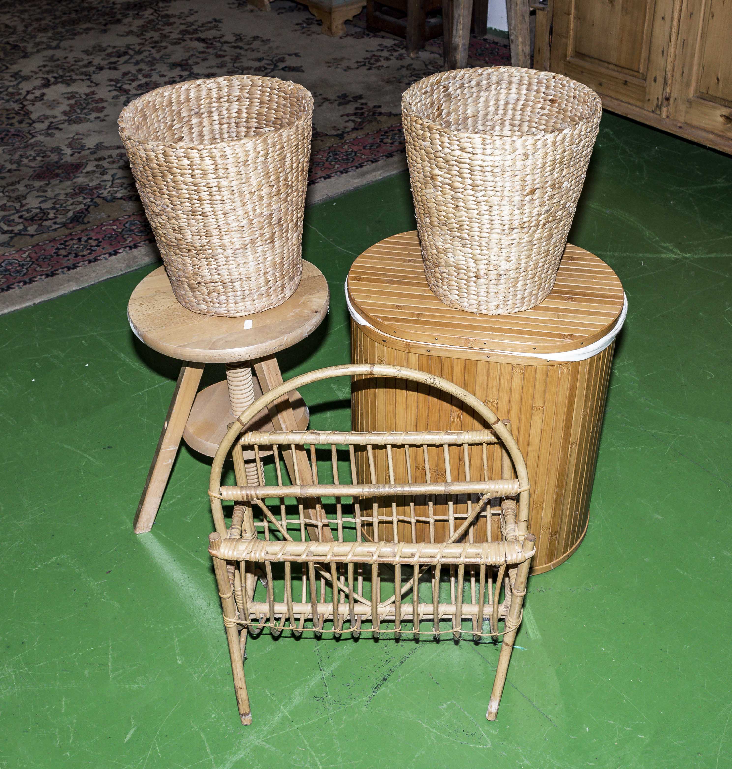 A linen basket, stool, magazine rack and two baskets
