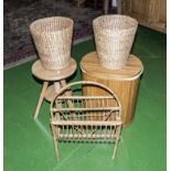 A linen basket, stool, magazine rack and two baskets