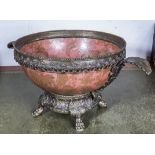 A reproduction pottery and brass mounted bowl.