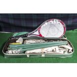 A badminton racquet and a badminton net