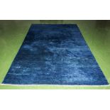 A blue ground wool rug 300 x 195cm