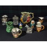 A collection of character jugs and others