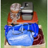 A suitcase, brief case, two vanity boxes and holdalls