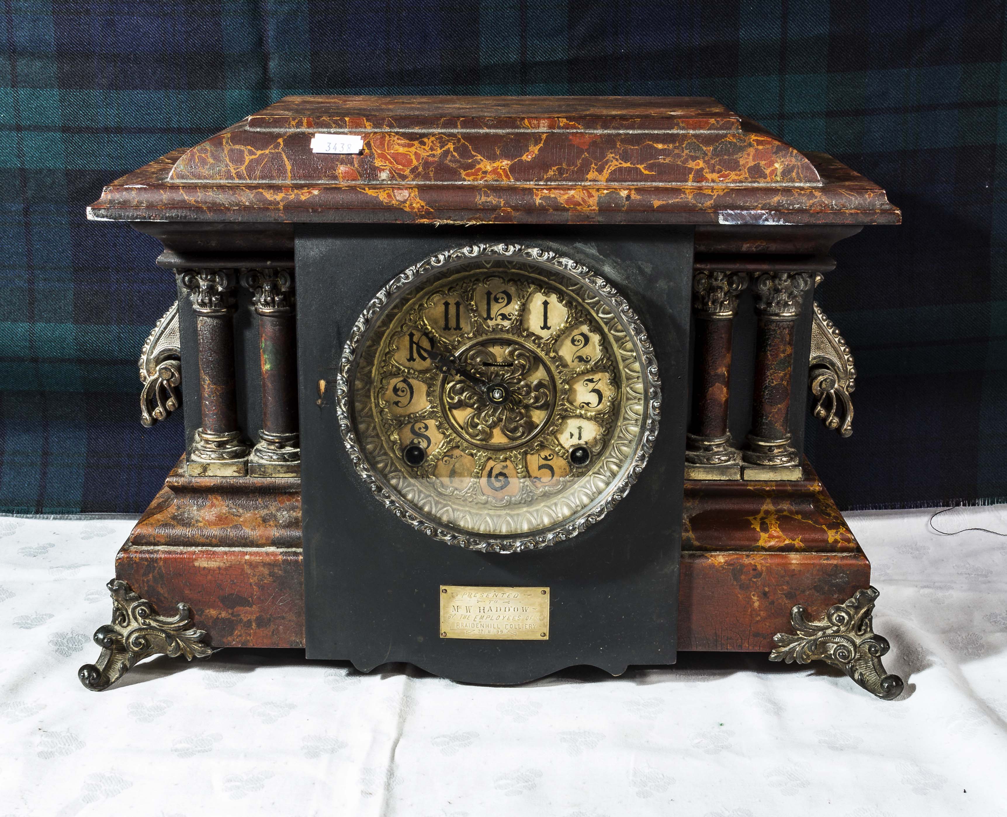 A painted wood mantle clock