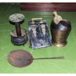 A coal depot, bucket, bellows and other metal items