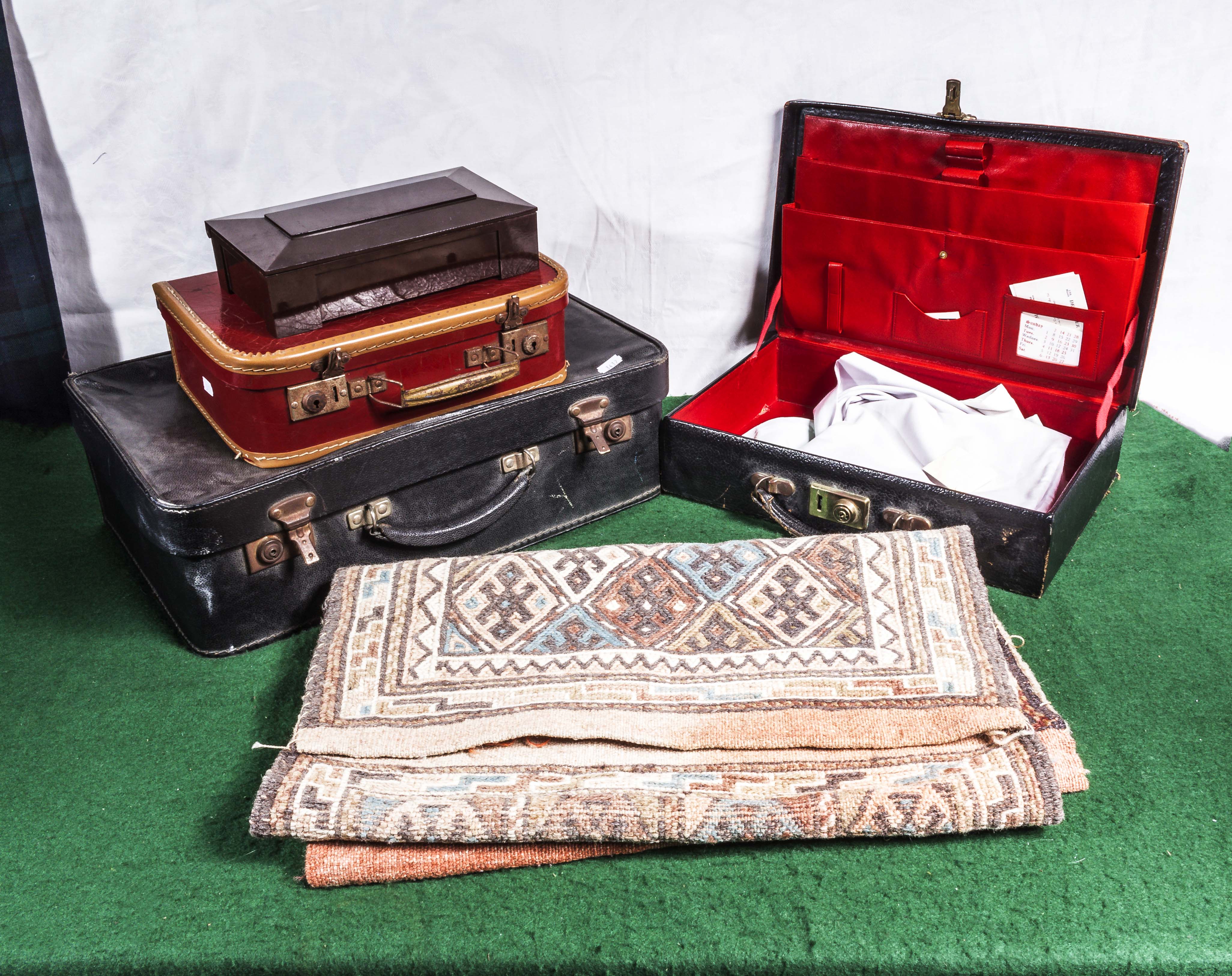 Three vintage cases a box and a saddle bag