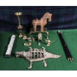 A tripod, terracotta horse and brass ware