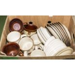 A box containing assorted tea ware