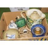 A box containing assorted pottery