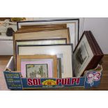 A number of framed prints