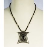 Large Tuareg necklace with small black onyx stone from tribes people in northern Sahara region