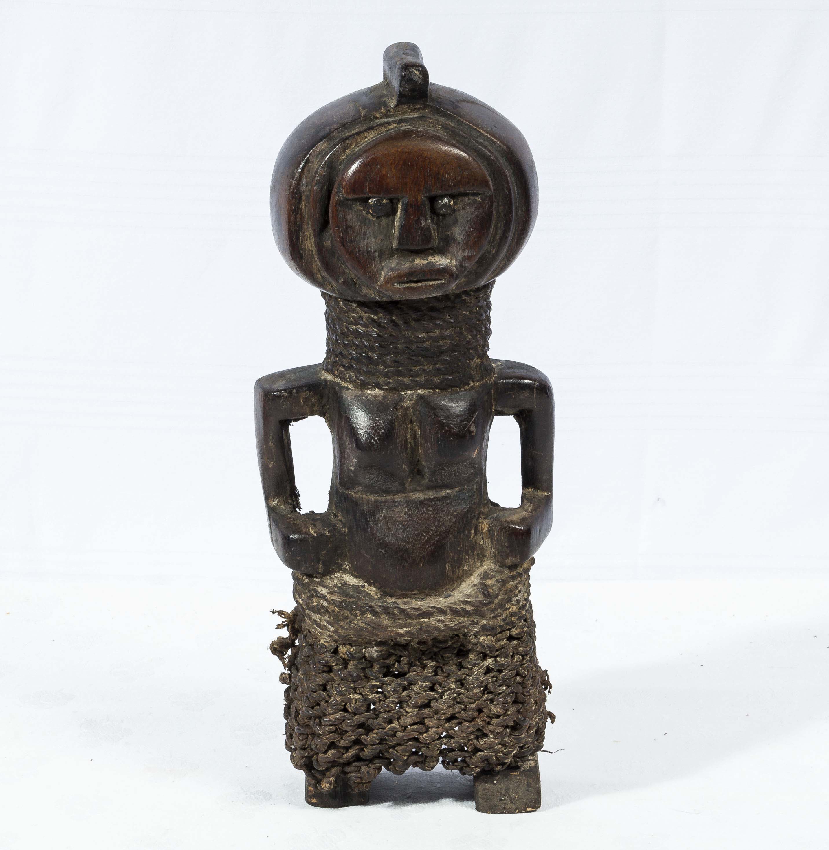 Small West African fertility figure with natural fibre skirt and necklace early 20th century