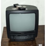 Hitachi portable Television video player/recorder. complete with remote and indoor aerial