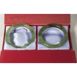 Two solid jade bangles