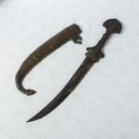 An Arabian dagger and scabbard