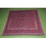 A tribal Gazac rug 114 x 123cm