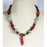 Old tribal necklace (re-strung) made up of fossil red coral, turquoise, old bereber silver beads and