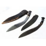 Two Kukri machetes with scabbards