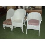 Three Lloyd Loom style chairs