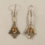 A pair of 9ct gold earrings with citrine drops