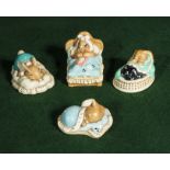 Four Pendelfin sleeping Bunny figures