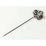 A Charles Horner Scottish thistle hat pin set with two amethyst