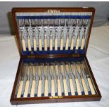 A cased set of fish cutlery