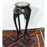 A Chinese urn stand with pink marble insert top.93 cm tall