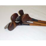 A bundle of vintage hickory golf clubs