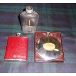 Two hip flasks and a Sporran flask