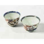 Two small 17th/18th century antique Chinese tea bowls decorated in the Imari palette, 6cm diameter