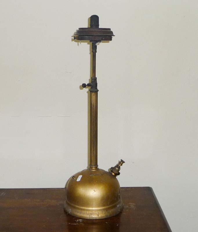 A vintage brass paraffin lamp