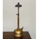 A vintage brass paraffin lamp