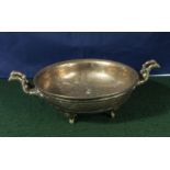 An antique Chinese bronze censer with elephant feet and handles, Chinese character marks to base