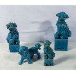 Four antique Chinese porcelain foo dogs in turquoise enamel colours 11cm, 18cm, 20cm, 26cm