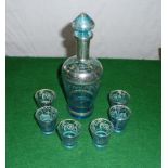 A 19th century Italian decanter and six glasses decorated in silver leaf