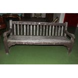 An old heavy wood garden bench.6ft wide .2ft 6inch tall.