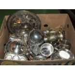 A box containing silver plated ware