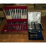 Three cased sets of cutlery